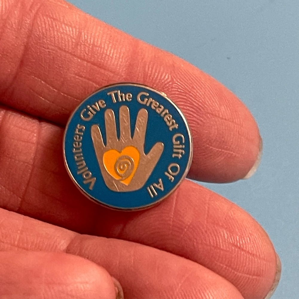 Volunteers Give The Greatest Gift Of All - Enamel Blue Lapel Pin